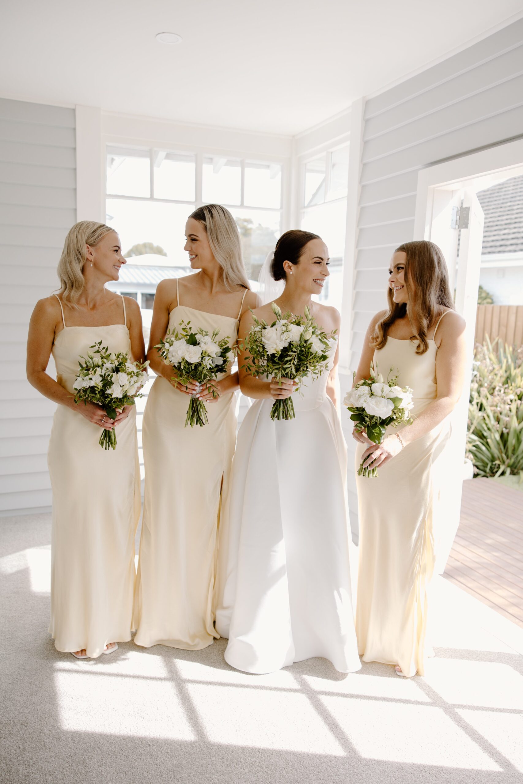 Bride and Bridesmaids Standing before the wedding ceremony