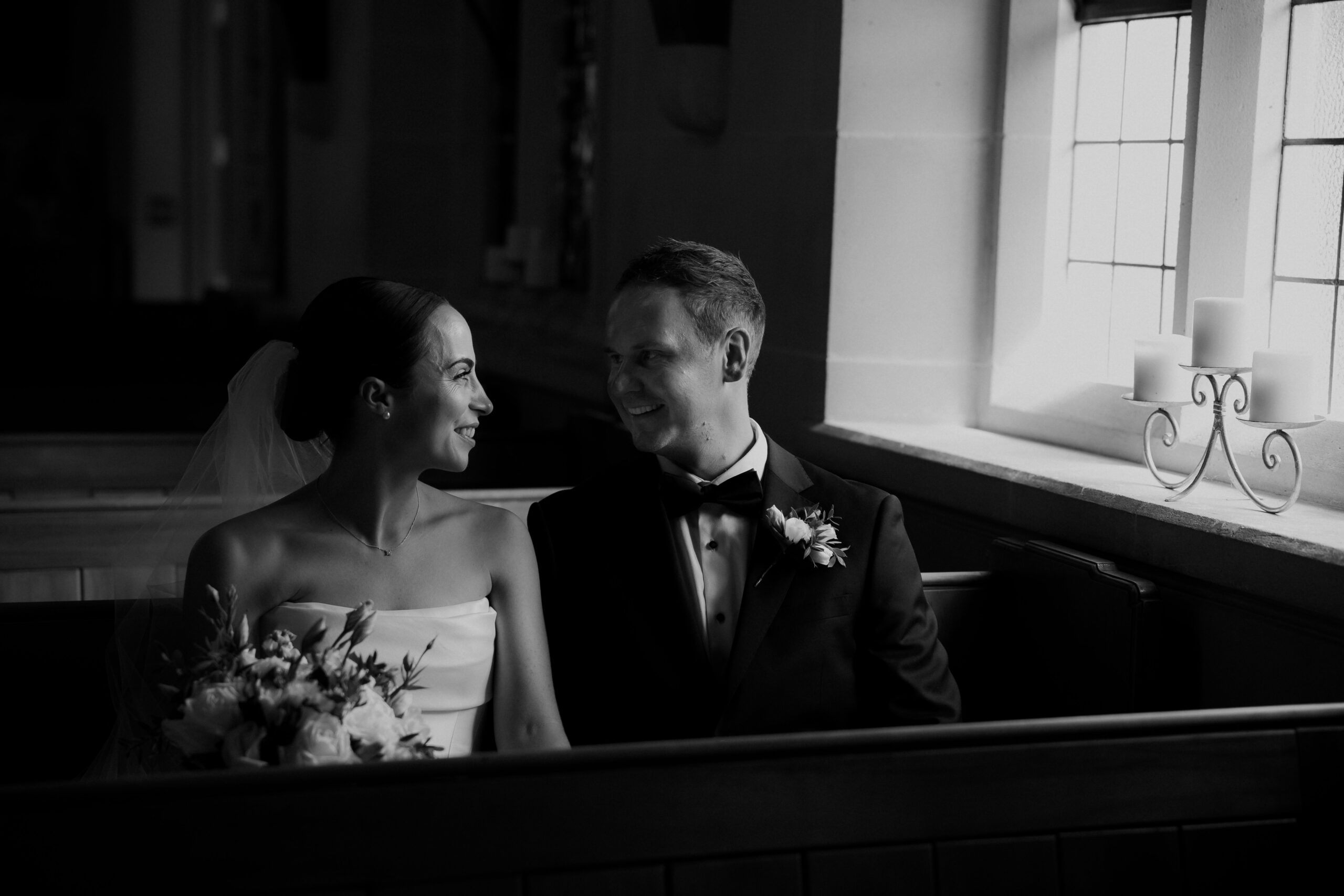Black and White photo of Bride and Groom inside Cashmere Church