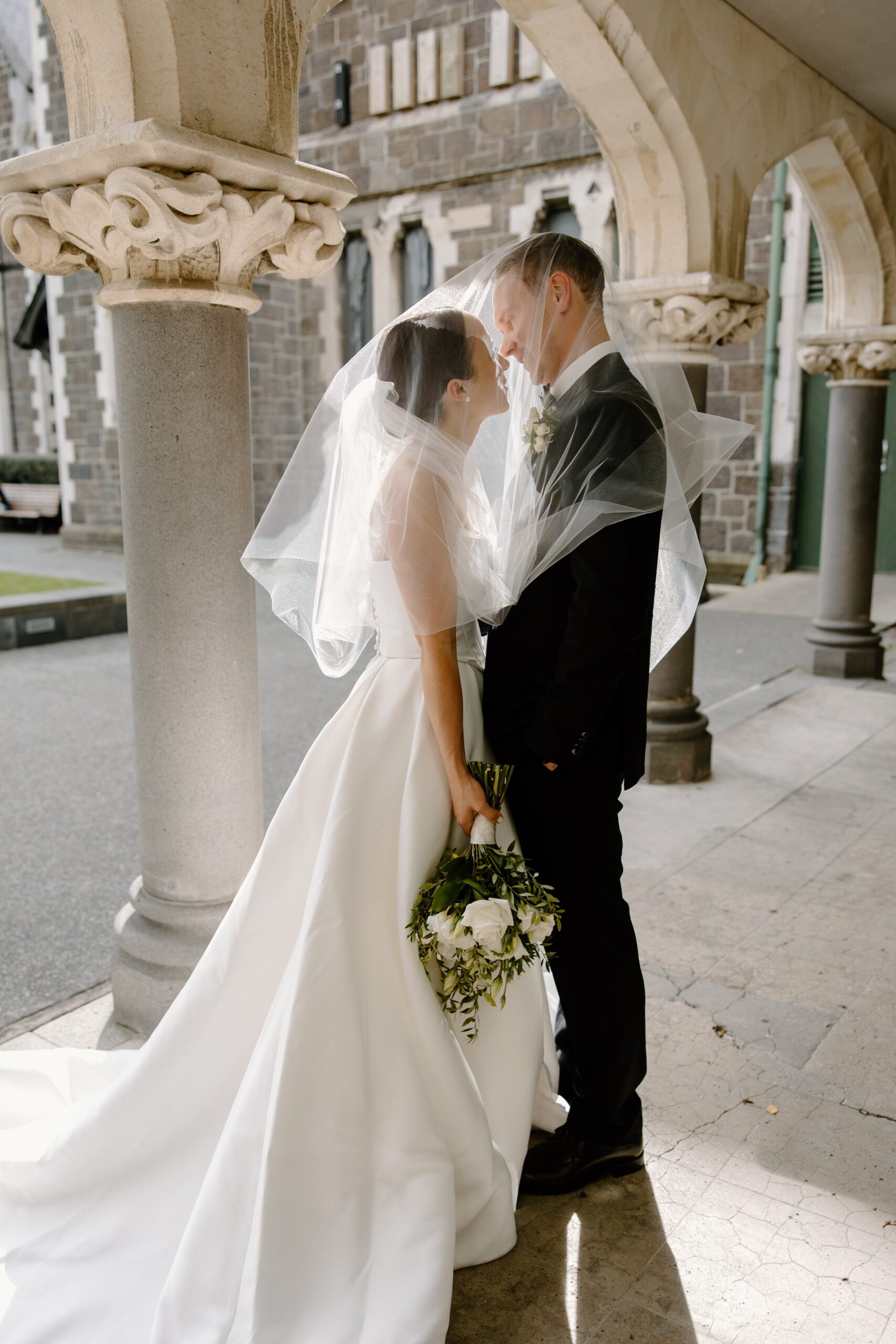 Couple at The Arts Centre Christchurch for wedding photos
