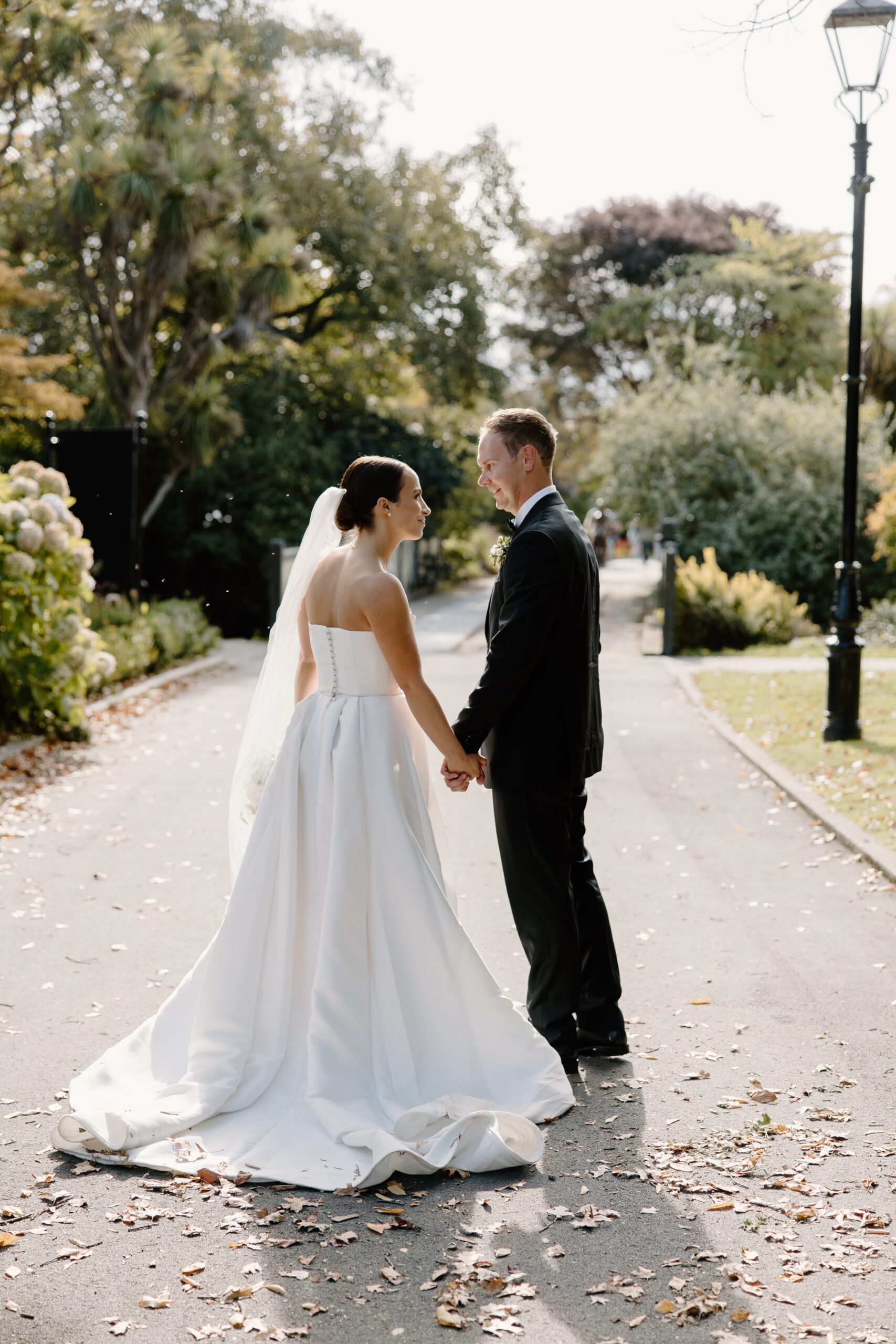 Bride and Groom walking around the gardens at Mona Vale