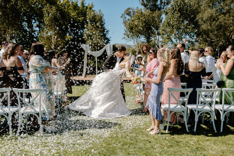 Tai Tapu Hotel Wedding couple under confetti